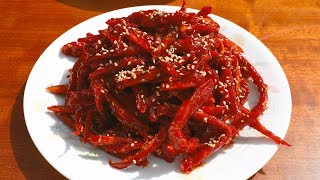 Dried shredded pollock seasoned with gochujang (Bugeopo gochujang-muchim: 북어포 고추장무침)