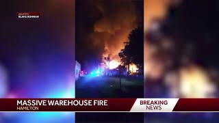 Crews on scene after massive fire breaks out at warehouse in Butler County