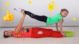 Alena and mom are learning funny yoga exercises
