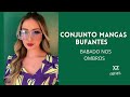 conjunto mangas bufantes e detalhes em babado nos ombros.