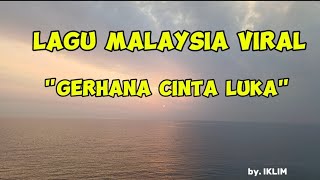 IKLIM.  Gerhana Cinta Luka.  Lirik