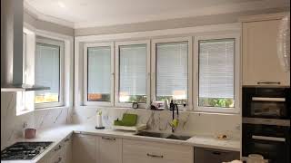 uPVC double glazed tilt and turn windows with Sunbell blinds between glass