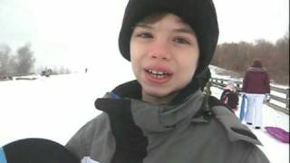 Connor snowboarding at Deadman's Hill in Hines Park