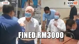 Najib slapped with RM3,000 compound for SOP violation at chicken rice shop