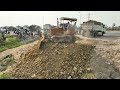 starting new project landfill huge size by bulldozer d31p komatsu 5ton team dump truck unloading