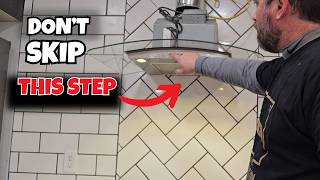 Install a vented range hood on tile wall