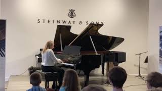 Ella playing Bach on a $230k piano