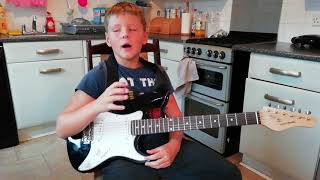 First song playing on the guitar  ' once I was seven years old'