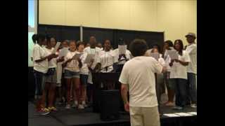 2012 World Choir Games debut of Many Voices One Song