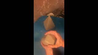 Clay Making a Pyramid