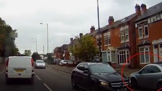 Impatient Driver Drives Car Along Pavement On Wrong Side Of The Road To Beat The Traffic