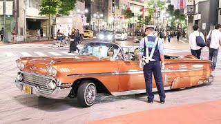 COPS TRY TO STOP LOWRIDERS FROM HOPPIN