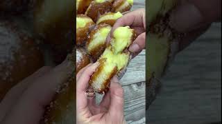 Very soft fried doughnuts with cream filling