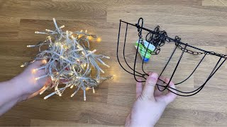 Wrap string light around a Dollar Store basket for this BREATHTAKING idea!