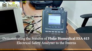 Demonstrating the features of Fluke Biomedical ESA 615 Electrical Safety Analyzer to the Interns