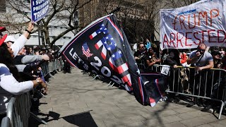 Trump supporters and anti-Trump protesters face off in heated showdown