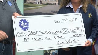 Guys Who Give presents donation to Gibault Children's Services