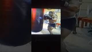 Iron Mike Tyson - (SHORT CLIP OF HIM PUNCHING THE SPEED BAG & HEAVY BAG)