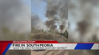 Fire in South Peoria field sends smoke soaring into the sky