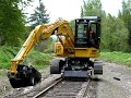 cat313 cu high rail excavator with rotogripp vid3