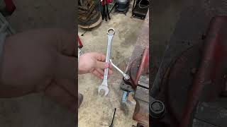 Using two combination wrench’s to break a bolt loose!