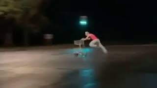 man runs with a shopping cart towards the red lights sensor camera