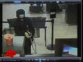 Raw Video: Bank Robber on Crutches