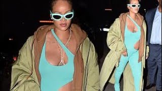 THICC AF! Rihanna SHOWS OFF her baby bump in a form-fitting aqua jumpsuit at Paris Fashion Week
