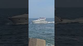 Exquisite yacht coasts through the Inlet.