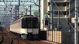 ゆっくり通過する 近鉄9820系9827F EH27 阪神石屋川