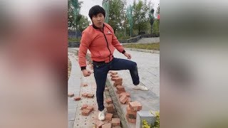 Kung fu master smashes 50 bricks in 40 seconds