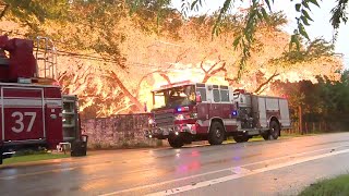 Video: Downed power lines cause small explosion, fire amid storm on North Side