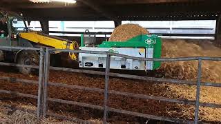 Spread-a-Bale Mini working in livestock pens