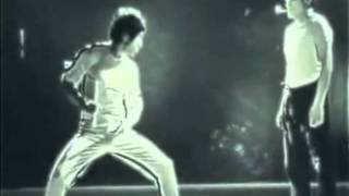 Bruce Lee lights matches