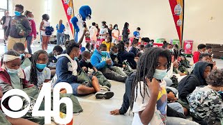 CBS46 provides free books to students at T H  Slater Elementary