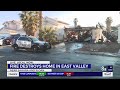 East Las Vegas valley house damaged in fire, neighbor reports hearing explosion