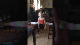 Help us! 8 year old doing the splits between chairs  any one help this little girl scholarship