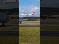 Qantas link Dash 8 arrival at Canberra with a Virgin 737 waiting to depart