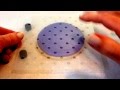 Stenciling a cookie with royal icing Stenciling a cookie with royal icing