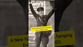 A New York policeman hanging from a girder 1920 நரேந்திர மோடி டொனால்ட் டிரம்ப் காவல்துறை அமெரிக்கா