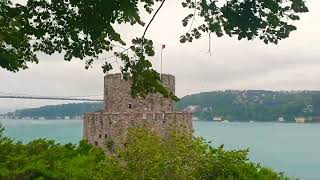 Rumeli Hisarı with Bosphorus Strait in the background and Fatih Sultan Mehmet Bridge