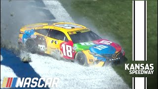 Kyle Busch loses a tire, spins through the grass at Kansas Speedway