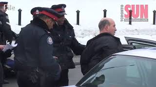 Man arrested at slain officer's funeral speaks out