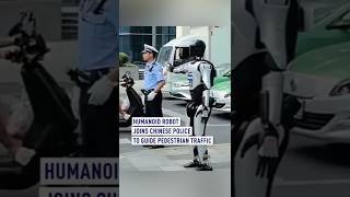 Humanoid robot joins Chinese police to guide pedestrian traffic