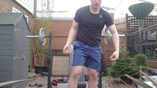 70kg seated overhead press for 7 reps.