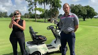 Tommi Ylijoki, the Links Golf Course Manager, demonstrates the Accessible Golf Cart.