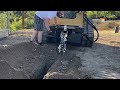 testing out a cheap skid steer trencher attachment