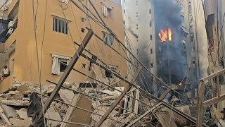 Building ablaze after fresh Israeli strikes on south Beirut | AFP