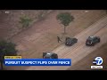 suspect front flips over fence during end of high speed chase in texas