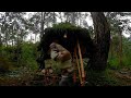 Camping alone building air survival shelter. Bushcraft. Camping in the rain